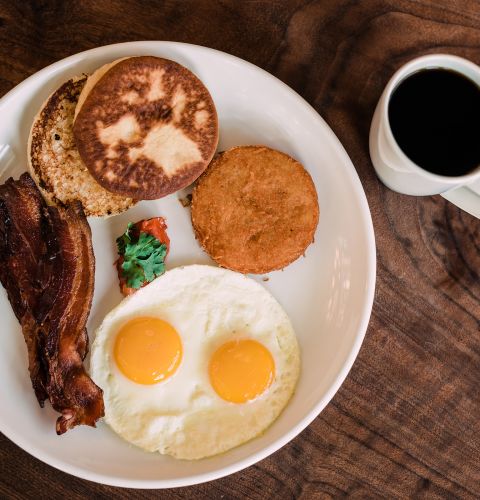 Classic Breakfast at Urban Farmer - Sunny Side Up Eggs, Bacon, Coffee
