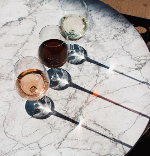 A Group Of Glasses On A Table